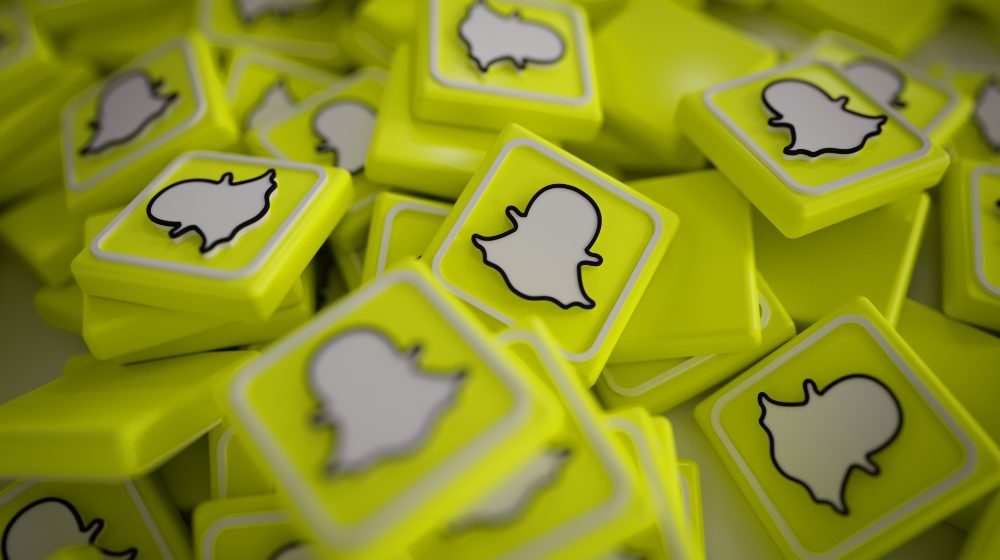 pile-3d-snapchat-logos Snapchat introduces AI chatbot to mixed reviews