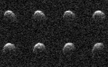 NASA radar images show stadium-sized asteroid tumbling by Earth during flyby (photos)