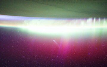 ISS astronauts see comet Lemmon ‘absorbed’ by aurora | Space photo of the day for Nov. 20, 2025