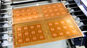 Future AI chips could be built on glass