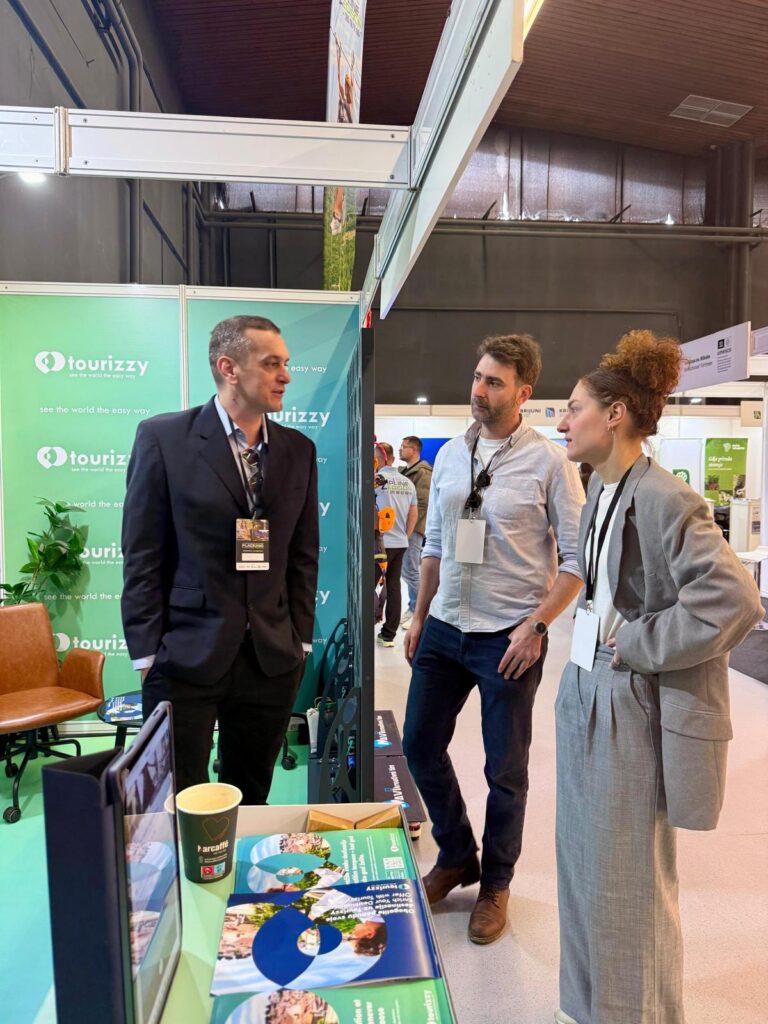 Tourizzy CEO Milan Gudeljević at the company’s exhibition stand, introducing visitors to the concept of self-guided video walking tours.