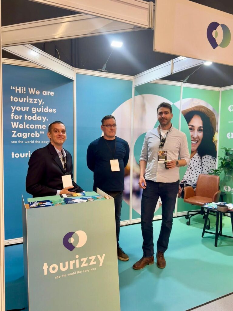 Milan Gudeljević speaking with event visitors about Tourizzy, local storytelling and new ways of exploring cities independently.